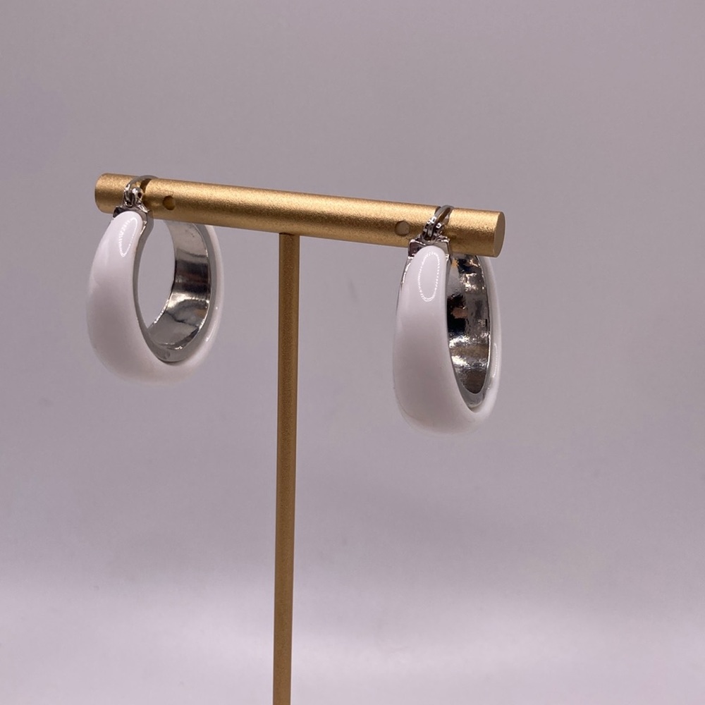 White and silver hoop earrings